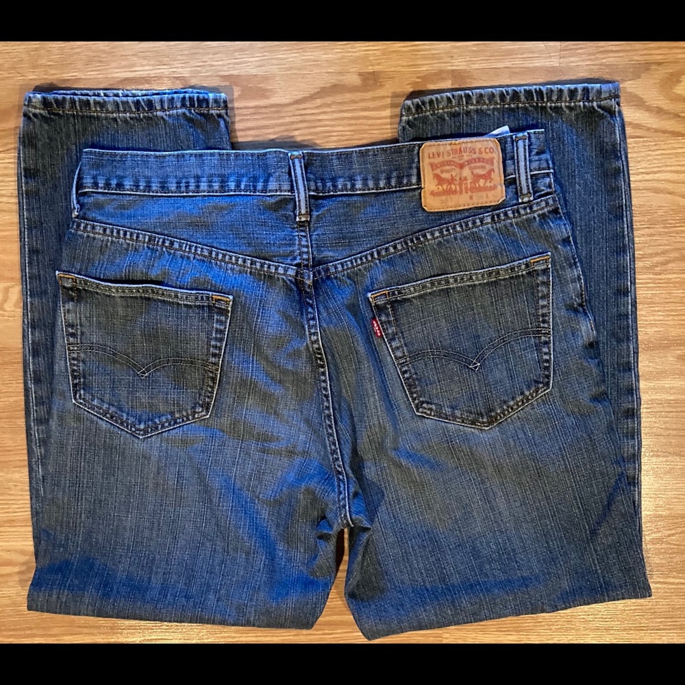 Title:
Levi’s Men’s 550 Jeans 36x30 Blue Medium – Great Preowned condition…